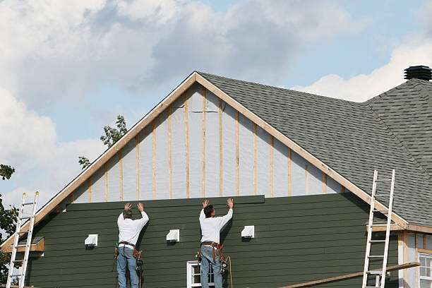 Professional Siding Installation technician working in Angier, NC
